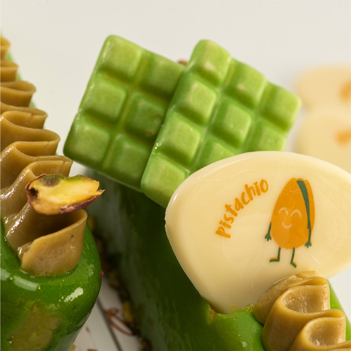  TABLETTE CHOCO BLANCO PISTACHO 35X26MM - 36 UDS