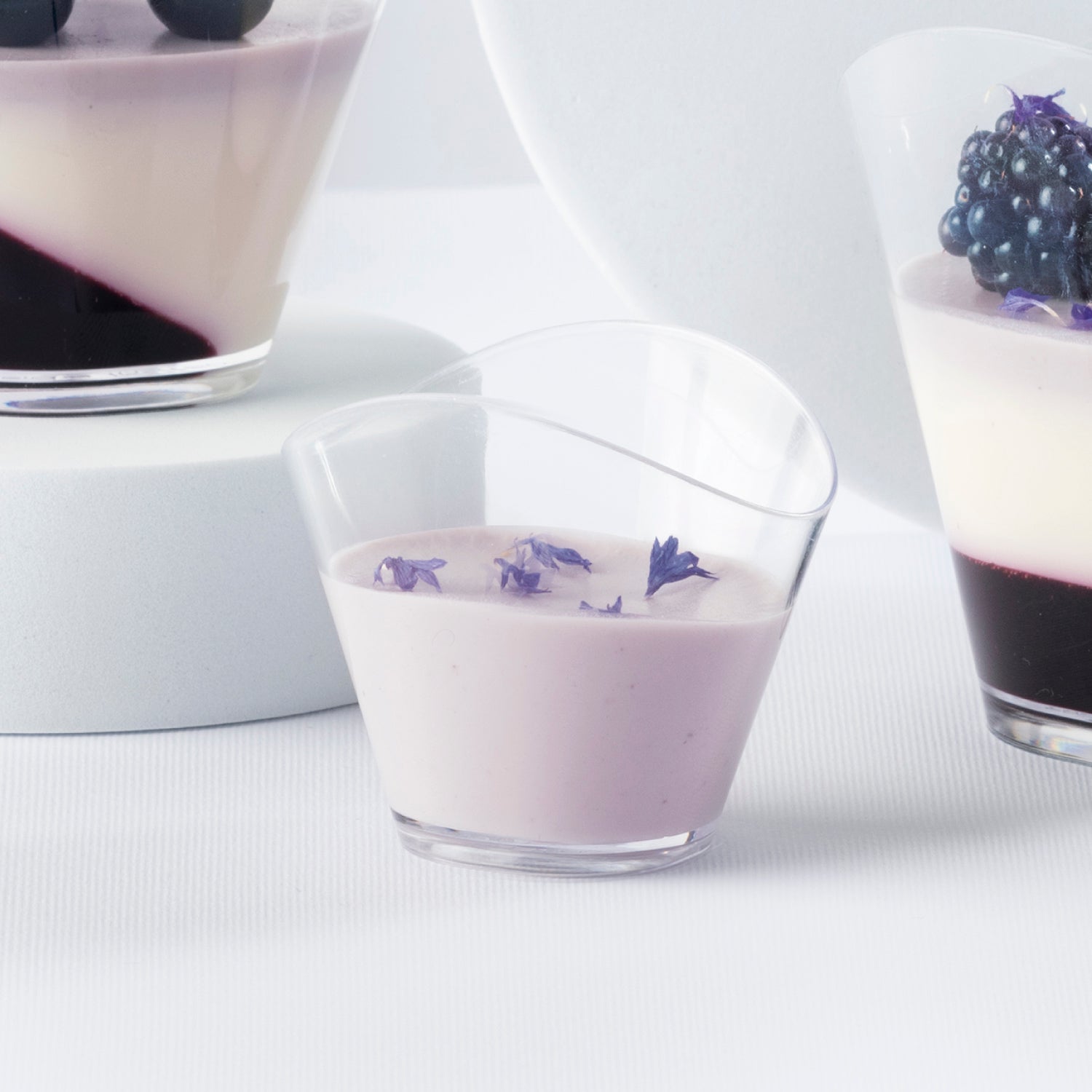 TRANSPARENT PLASTIC CUP WAVE CAP. 50 ML